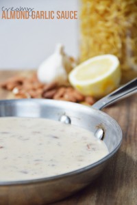 This creamy almond garlic sauce is dairy-free and delicious! Try it on pasta, zoodles, stir-fries and Buddha Bowls.