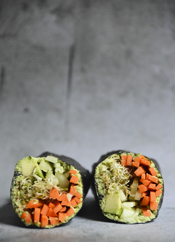 Easy Vegan Nori Wraps - These easy nori wraps make for a quick lunch! They're made with veggies and your favorite hummus. #vegan #plantbased #recipe https://pumpsandiron.com