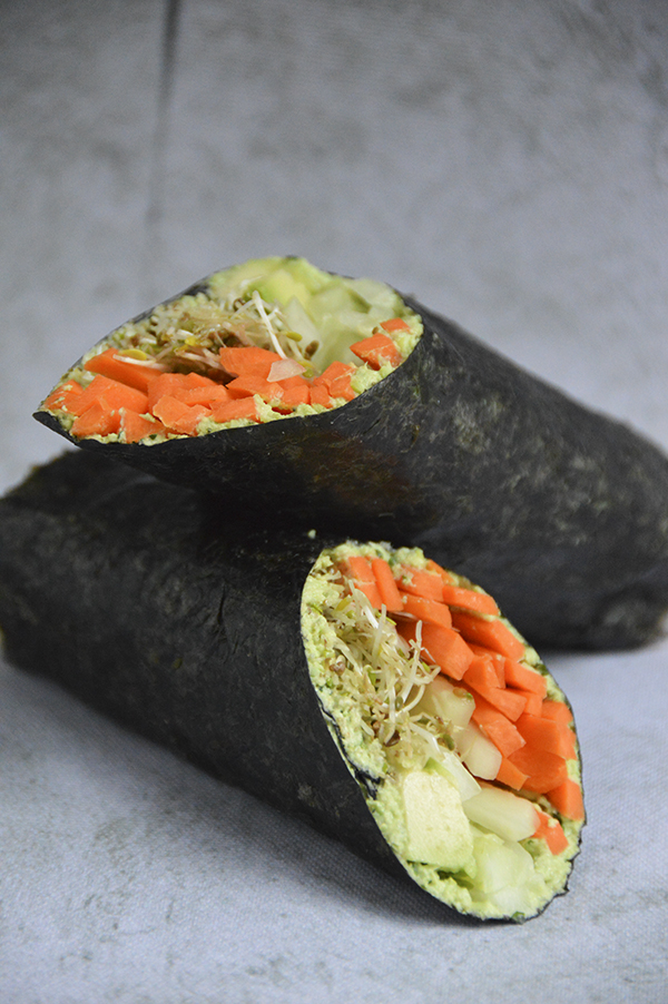 Easy Vegan Nori Wraps - These easy nori wraps make for a quick lunch! They're made with veggies and your favorite hummus. #vegan #plantbased #recipe https://pumpsandiron.com